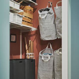 storage baskets on walls in utility