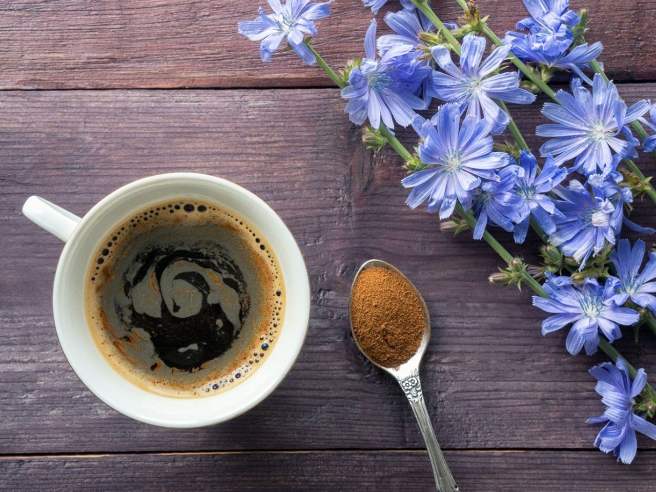 Purple Flowers Next To Cup Of Coffee