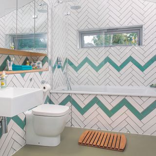 White bathroom with turquoise chevron pattern