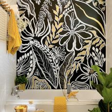 bathroom with blackboard vinyl on the wall above the bath