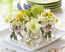 Easter table decor ideas centerpiece filled with spring flowers