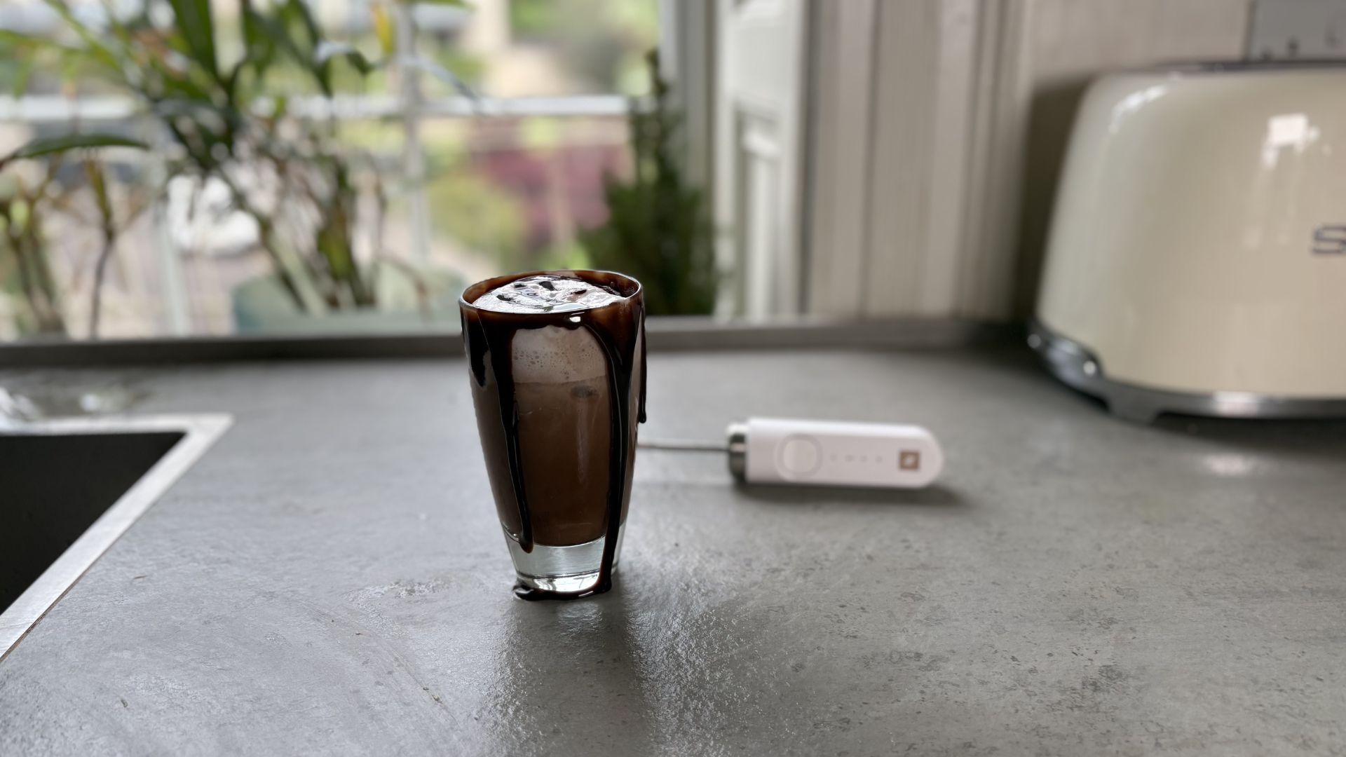 Nespresso NanoFoamer Milk Frother being tested