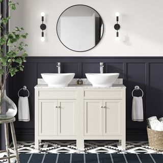 bathroom with upper wall painted white and lower section panelled black