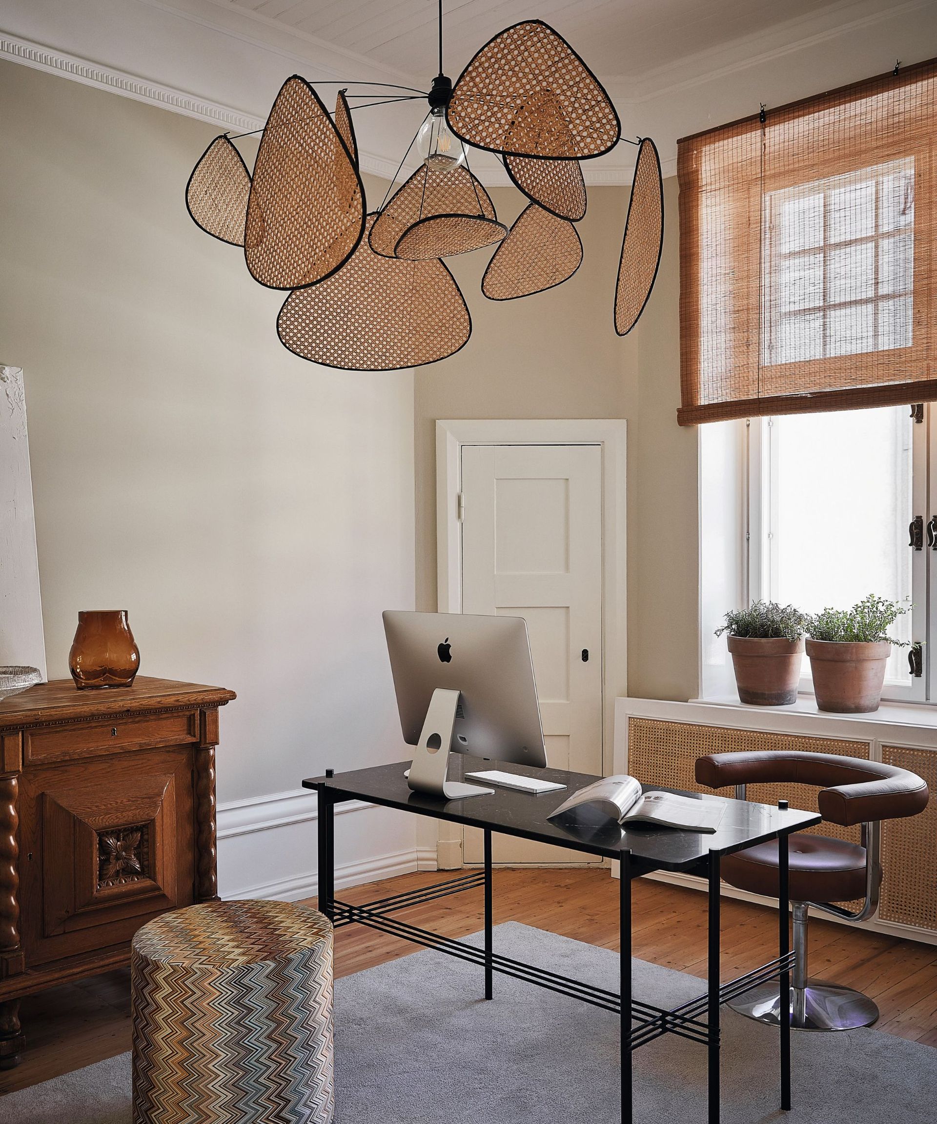 Black stable, wooden cabinet, white door, blind