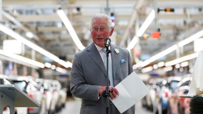 Prince Charles, Prince of Wales, makes a speech on th production line to employees during his visit to the MINI plant in Oxford on June 8, 2021