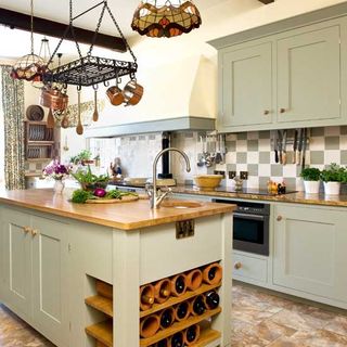 kitchen with tiled floor tap and vegetable