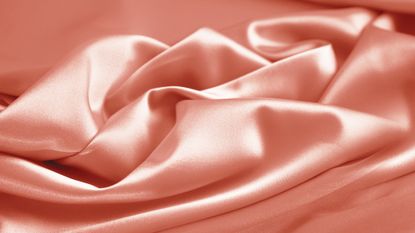 Kamasutra positions: A pink silk sheet