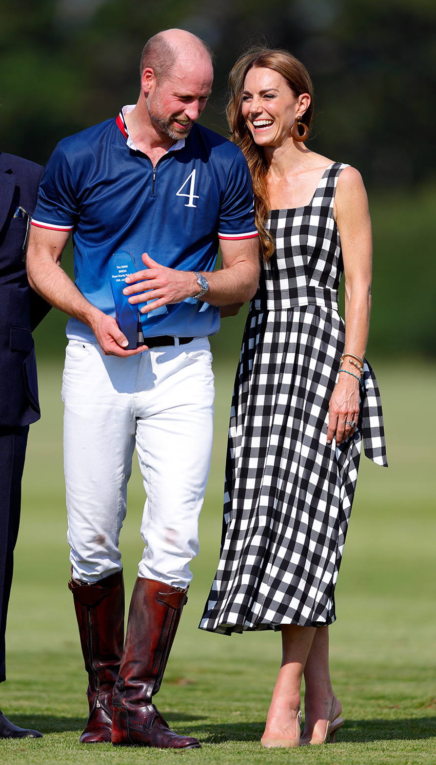 Prince William with Kate Middleton wearing an A-line black-and-white gingham dress and slingback nude pumps at a charity polo match
