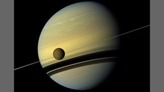 Saturn and its moon Titan, as seen by NASA's Cassini spacecraft.