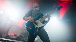 Taking Back Sunday bassist Shaun Cooper performs live