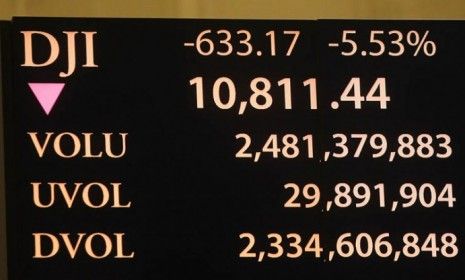 A New York Stock Exchange ticker shows Monday&amp;#039;s massive stock market drop -- the steepest one-day decline since the 2008 financial crisis.