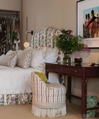 grandmillennial floral english bedroom with vanity deck and small chair