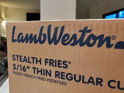 closeup of cardboard Lamb Weston french fry box