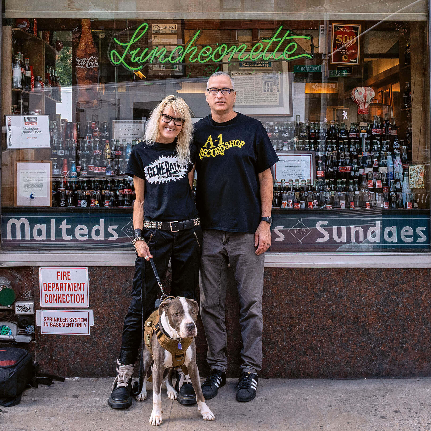 Portrait of James T. &amp;amp; Karla L. Murray along with their dog.