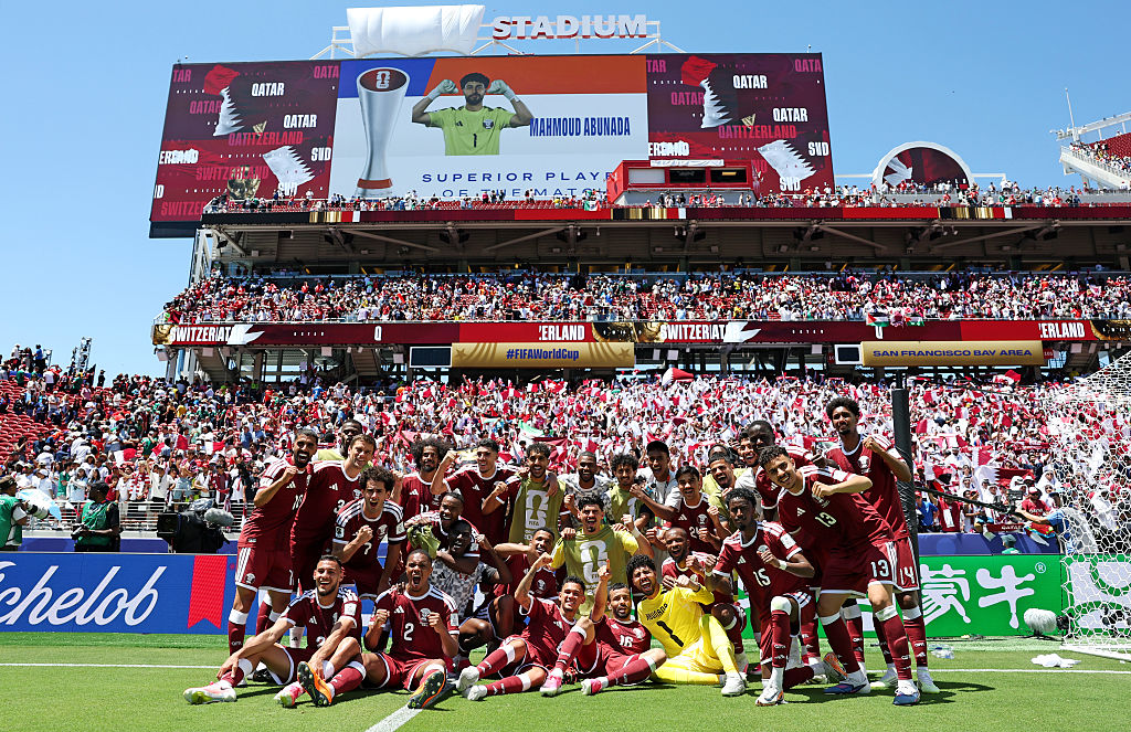 Qatar players pose for a team photograph after the 1-1 draw during the FIFA World Cup 2026 Group B match between Qatar and Switzerland at San Francisco Bay Area Stadium on June 13, 2026