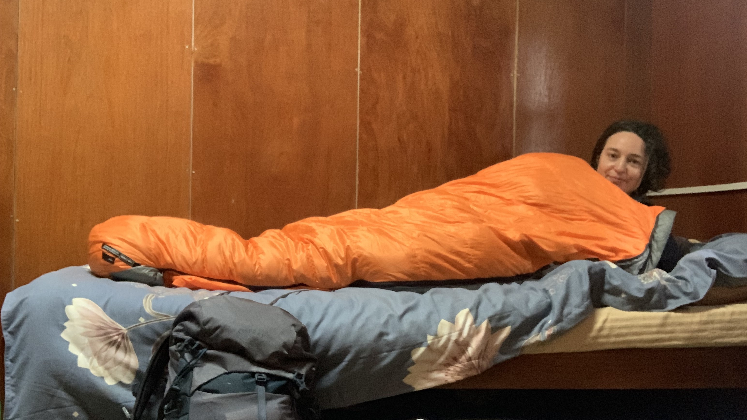 Julia in her sleeping bag in teahouse while trekking to Everest Base Camp