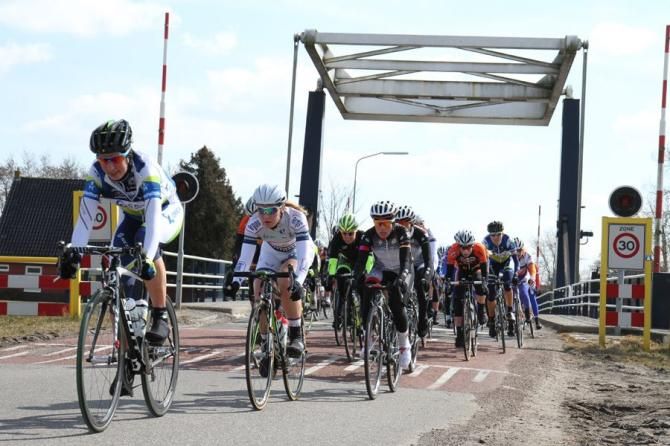 Loes Gunnewijk (Orica-AIS) passes over one of the bridges on Stage 1 at Energiewacht Tour