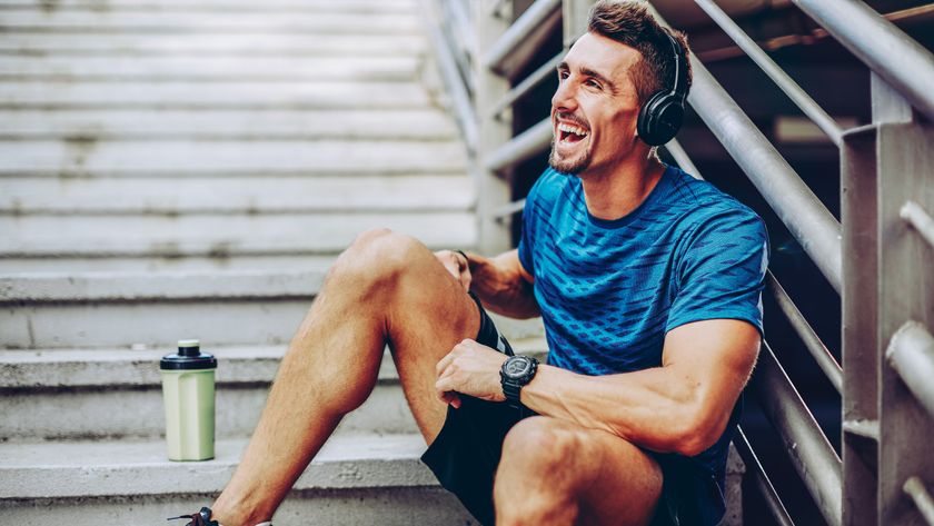 How to make your workout goals last - a happy man smiling after a workout 