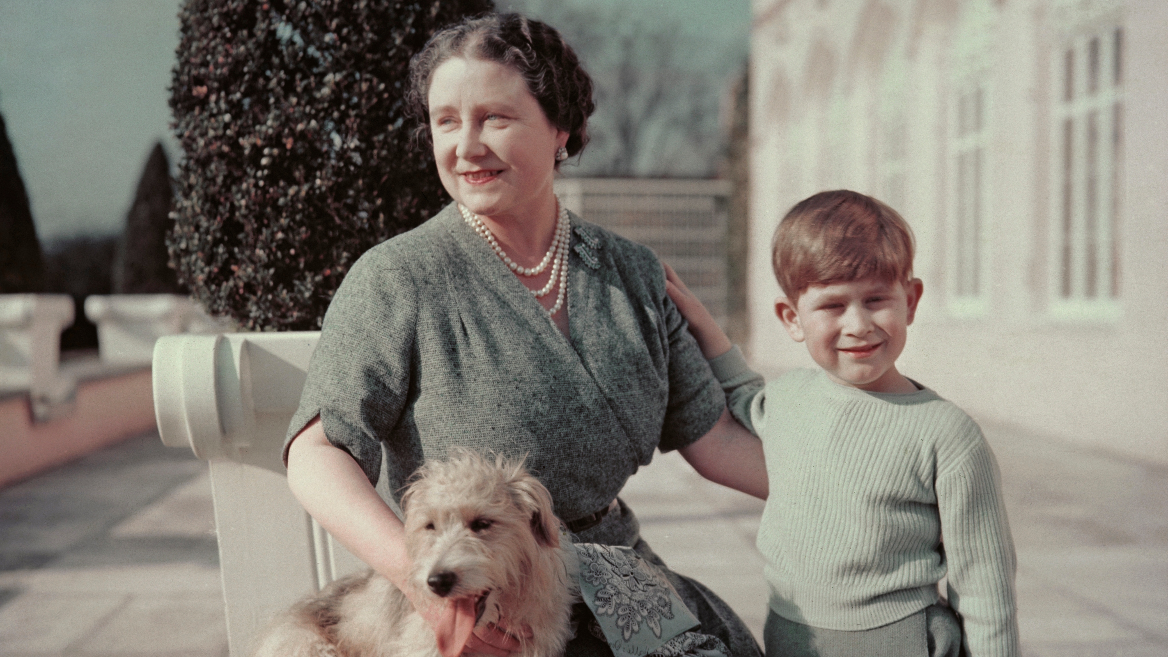 Queen Elizabeth with her grandson King Charles and Pippin the dog in 1950
