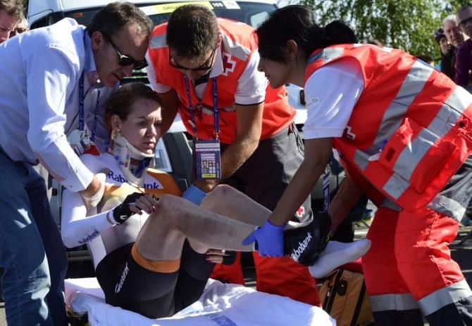 Anna Van der Breggen from Ravo Liv team after she was injured during the women's team time trial at the 2014 UCI Road World Championships in Ponferrada