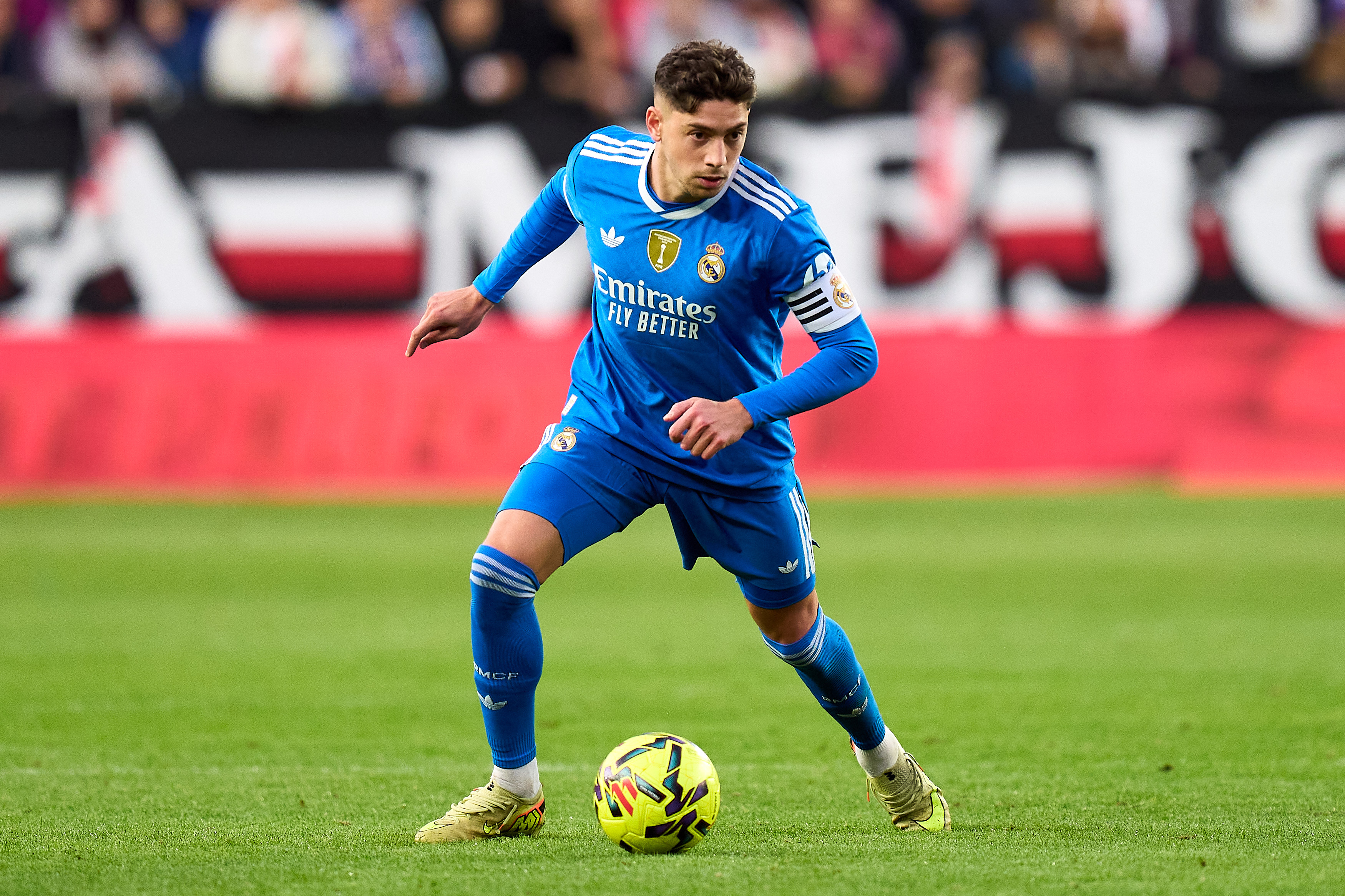 Federico Valverde of Real Madrid controls the ball during the LaLiga EA Sports match between Rayo Vallecano de Madrid and Real Madrid CF at Estadio de Vallecas on November 09, 2025 in Madrid, Spain.