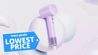 Laifen SE dryer in purple in lifestyle setting with tom's guide deal badge