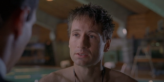 David Duchovny wears a red Speedo on The Chair.