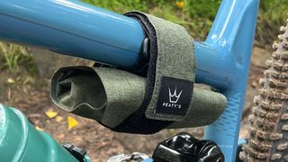 Peaty’s Holdfast Tool Wrap attached to bike frame