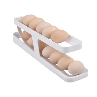 A rolling egg storage holder with eggs in it