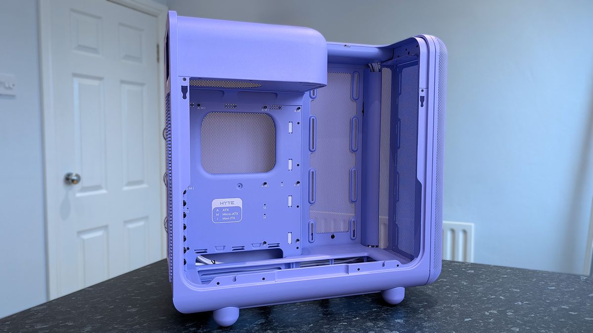 HYTE X50 Taro Milk PC case on a marble desk top, highlighting key features