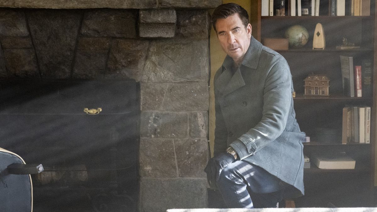 Dylan McDermott as Supervisory Special Agent Remy Scott next to a fireplace in FBI: Most Wanted season 5