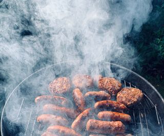 Smoky meat on a grill