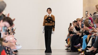 Victoria Beckham on the runway of one of her VB fashion shows
