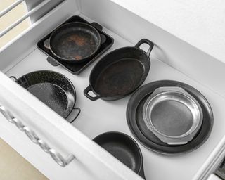 oven dishes in a drawer
