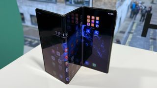 Huawei Mate XT resting on a table