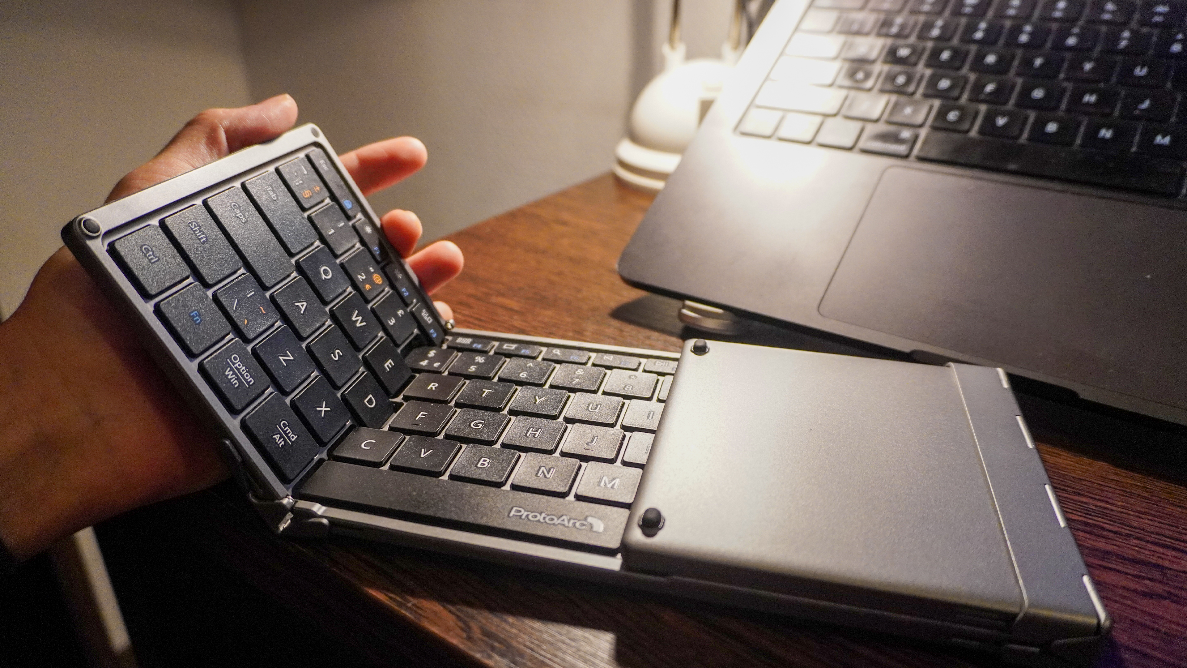 ProtoArc XKM01 foldable keyboard on a desk