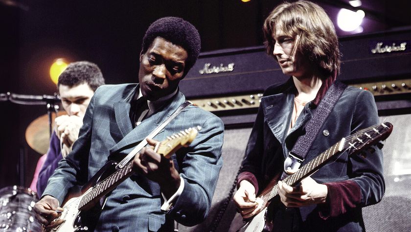 American guitarist Buddy Guy (left) performs live on stage with English guitarist Eric Clapton at the Supershow session at a disused factory in Staines, England on 26th March 1969. Eric Clapton plays a 1964 Gibson Firebird guitar. 