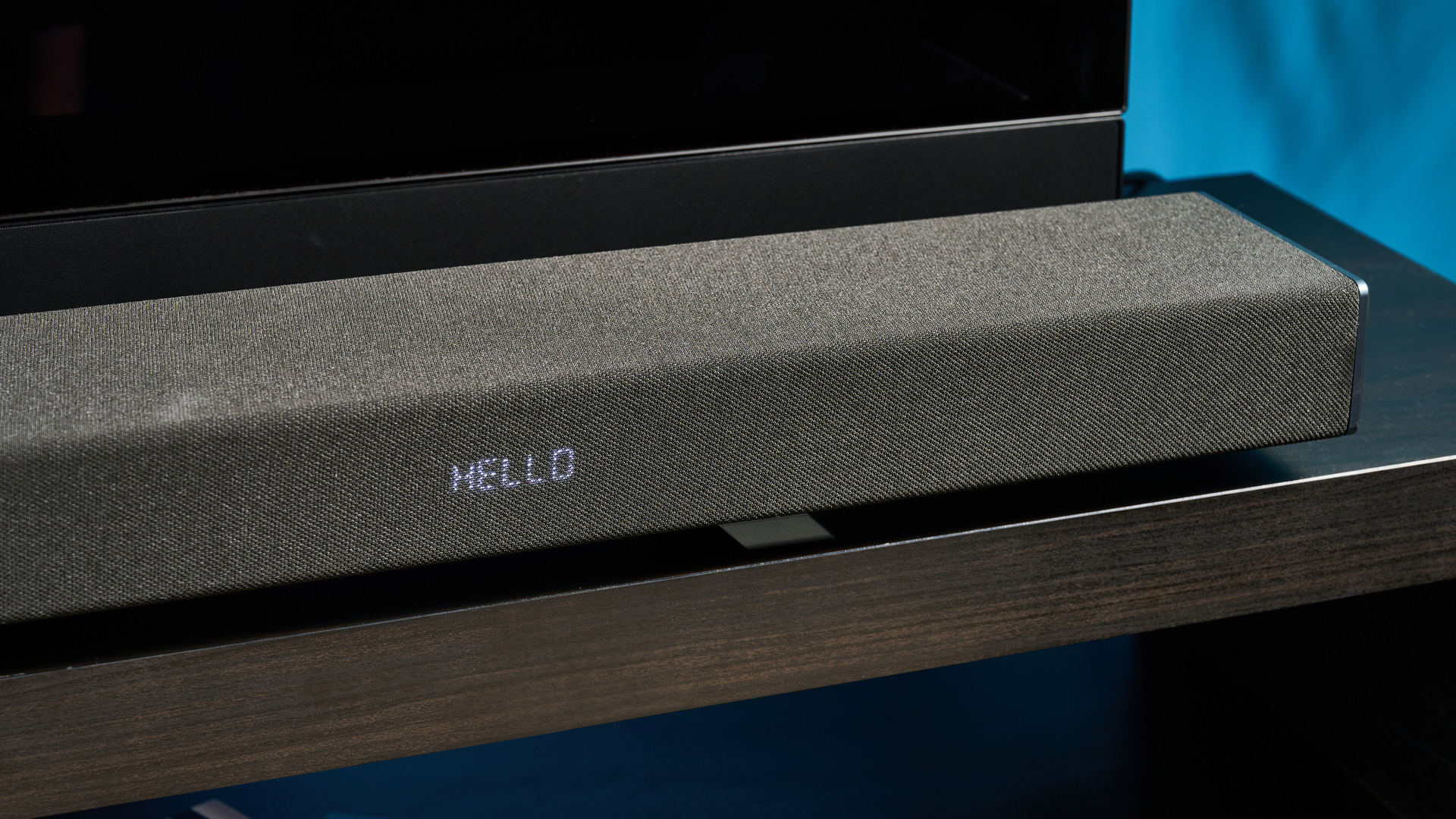 The Sharp 5.1.2 HT-SBW55121 Soundbar photographed in front of a blue background.