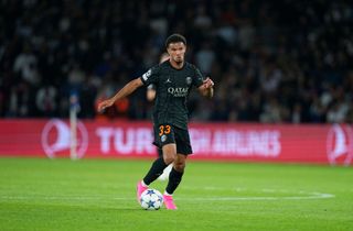 Warren Zaire-Emery of Paris Saint-Germain controls the ball during the UEFA Champions League match between Paris Saint-Germain and Borussia Dortmund at Parc des Princes on September 19, 2023 in Paris, France.