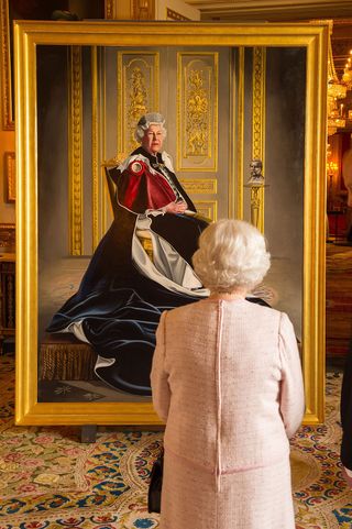 The Queen with her newly unveiled portrait by Henry Ward to mark 60 years as patron of the British Red Cross