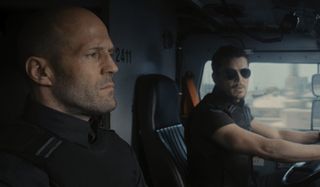 Jason Statham and Josh Hartnett in their armored truck in Wrath of Man.