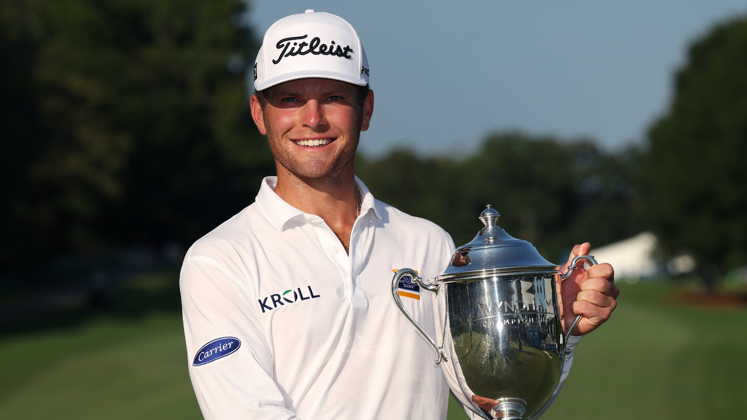Michael Brennan with the Wyndham Championship trophy