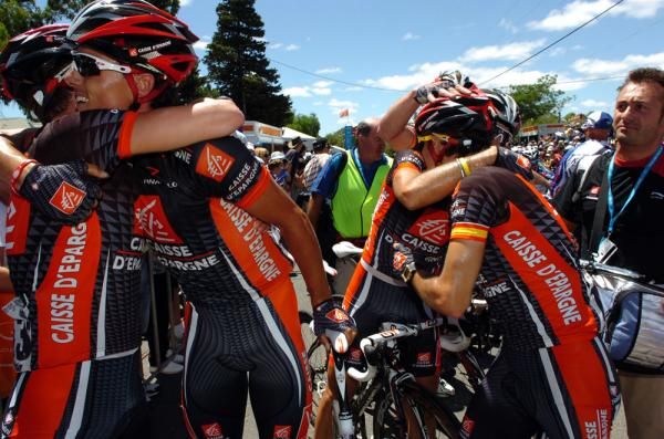 Caisse d'Epargne embrace each other after the stage