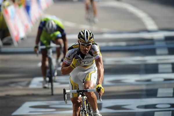 George Hincapie (Columbia-HTC) lets his teammates know he has crossed the line. Columbia couldn't quite hold the peloton up enough as Hincapie missed out on yellow by just five seconds
