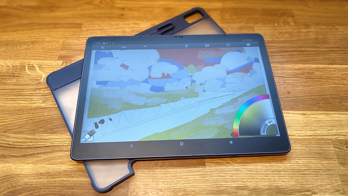 XPPen Magic Drawing Pad; a tablet on a wood table with clear case