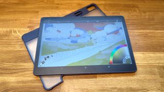 XPPen Magic Drawing Pad; a tablet on a wood table with clear case