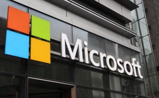 Microsoft Authenticator: Microsoft logo on an office building
