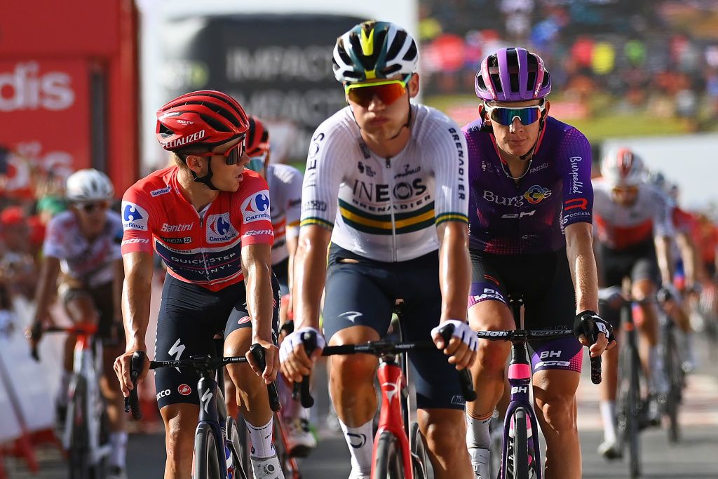 CABO DE GATA SPAIN AUGUST 31 LR Remco Evenepoel of Belgium and Team QuickStep Alpha Vinyl Red Leader Jersey and Jetse Bol of Netherlands and Team Burgos BH cross the finishing line during the 77th Tour of Spain 2022 Stage 11 a 1912km stage from ElPozo Alimentacin Alhama de Murcia to Cabo de Gata LaVuelta22 WorldTour on August 31 2022 in Cabo de Gata Spain Photo by Tim de WaeleGetty Images