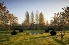 Malus 'Evereste' and yew onions flank a reflecting pool. The pavilion is by Adrian Rayment of RaymentWire. Credit: Britt Willoughby Dyer