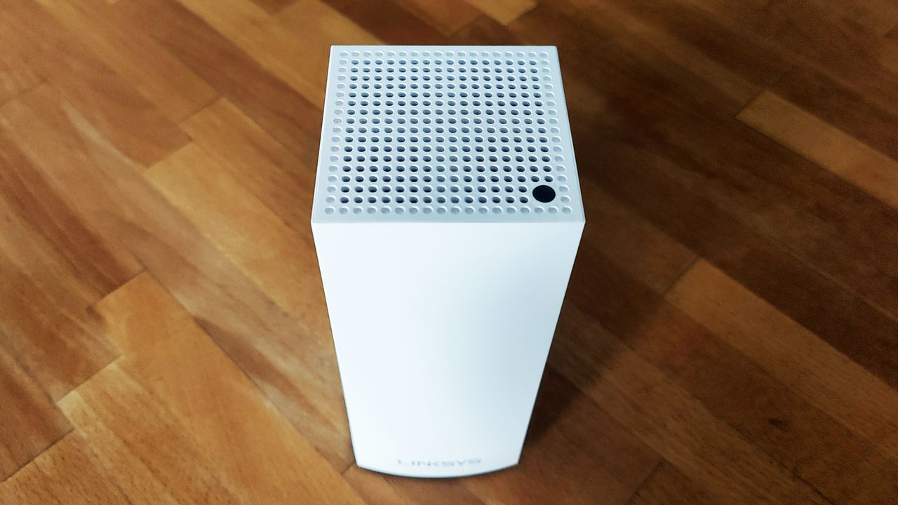 Linksys Atlas Pro 6 (AX5400) review: mesh network node on wooden table